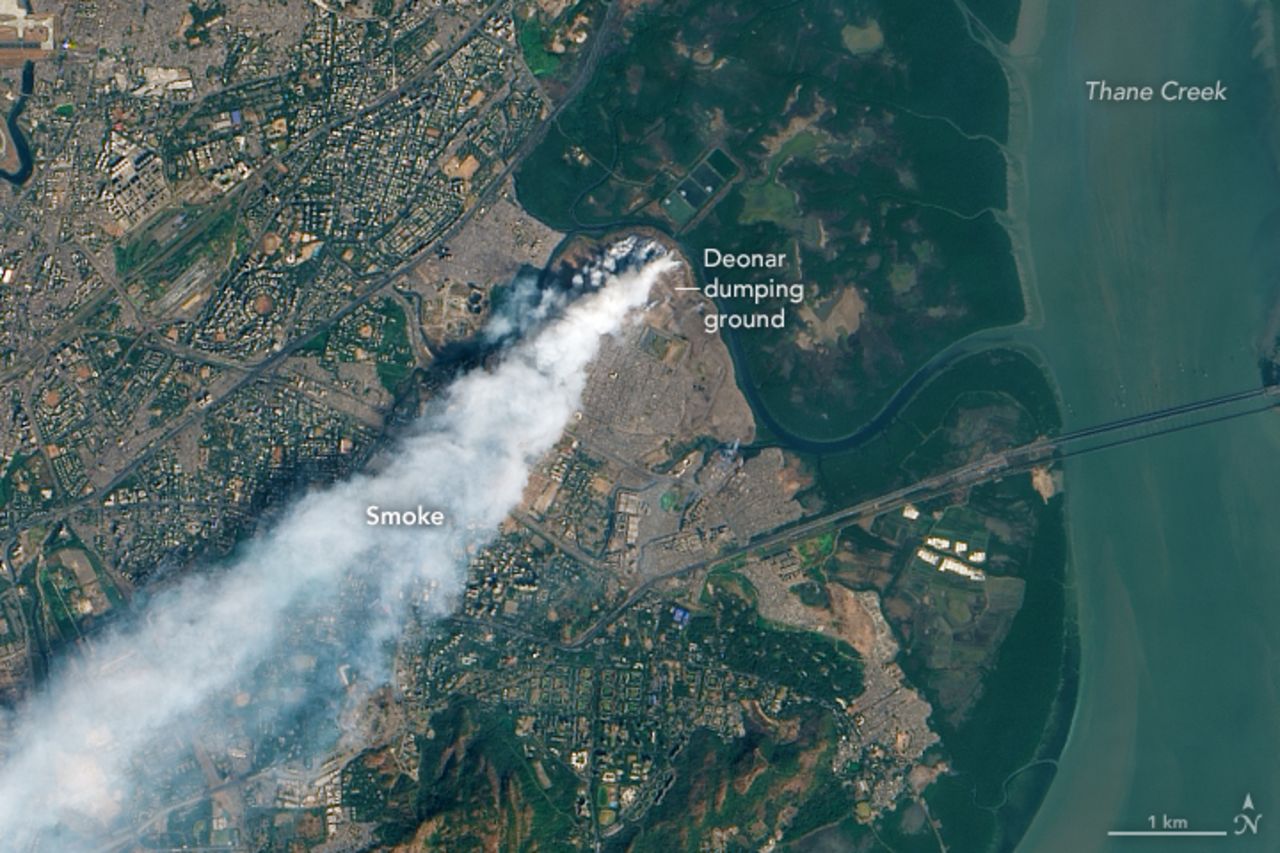 A NASA image shows the extent of a smoke plume from a huge blaze at the Deonar garbage dump in Mumbai.