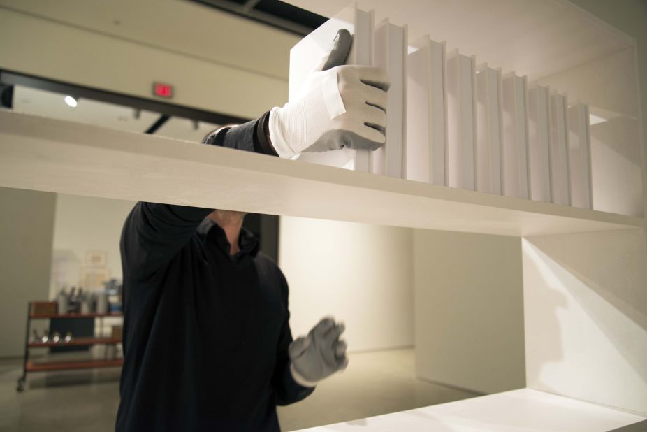 The interactive installation encourages visitors to donate books. In exchange, they will receive one blank, white book. 
