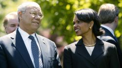 US Secretary of State Colin Powell (L) talks with National Security Advisor Condoleezza Rice (R) prior to US President George W. Bush and Jordan's King Abdullah II speaking in the Rose Garden at the White House 06 May 2004 in Washington, DC.
