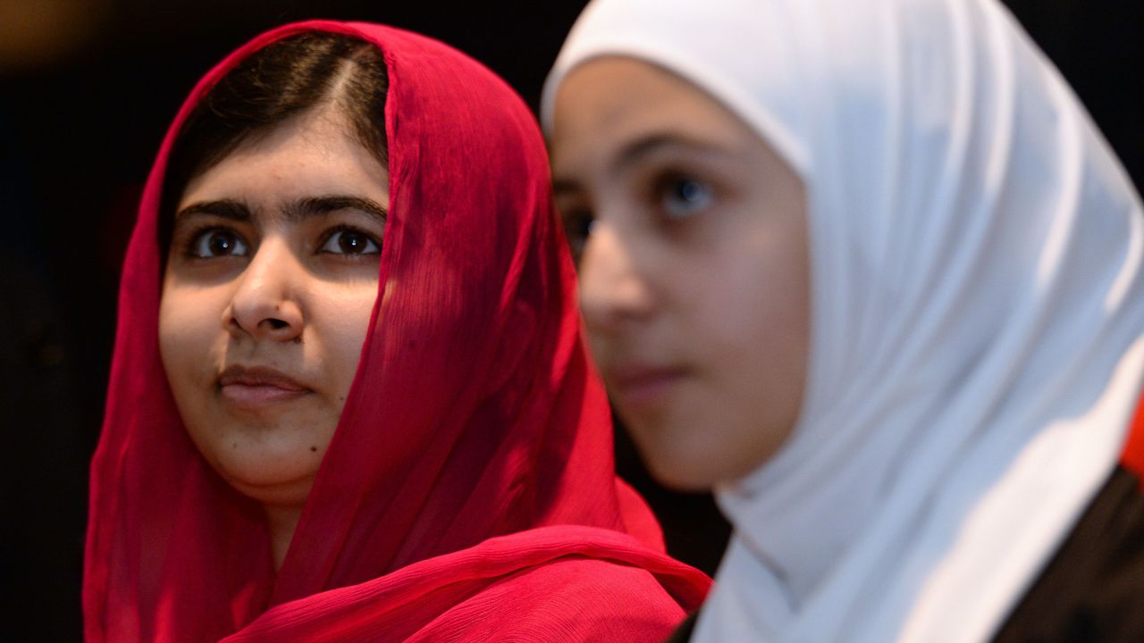Nobel Peace Prize winner Malala Yousafzai, left, and 17-year-old Syrian refugee Mazoun Almellehan attend an event at the London conference "Supporting Syria and the Region" on Thursday, February 4. 
