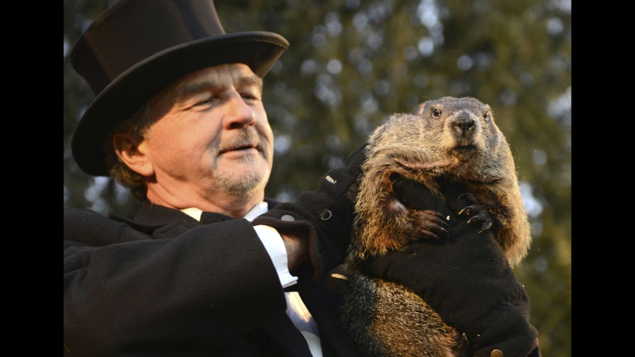 John Griffiths holds up Punxsutawney Phil after the famous Pennsylvania groundhog <a href="http://www.cnn.com/2016/02/02/living/groundhog-day-punxsutawney-phil/" target="_blank">made his annual weather prediction</a> on Tuesday, February 2. Phil didn't see his shadow, and according to legend, that means an early spring.