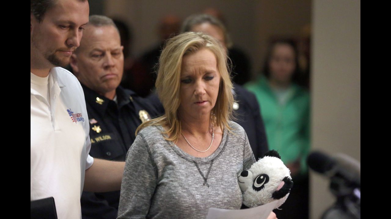 Tammy Weeks, right, mother of slain 13-year-old Nicole Lovell, moves towards the podium to speak about her daughter at a news conference on Tuesday February 2, in Blacksburg, Virginia.<a href="http://www.cnn.com/2016/02/04/us/virginia-tech-girl-killed-keepers-bail-denied/" target="_blank"> Two college students have been charged</a> after Nicole's body was found in a wooded area in North Carolina. <br />