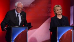 US Democratic presidential candidates Hillary Clinton (R) and Bernie Sanders participate in the MSNBC Democratic Candidates Debate at the University of New Hampshire in Durham on February 4, 2016.