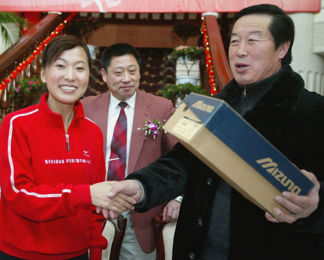 Wang Junxia and controversial athletics coach Ma Junren in 2005.