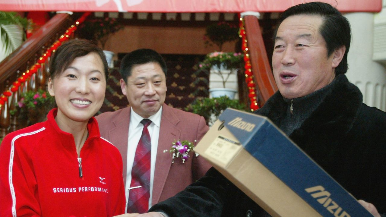 Wang Junxia and controversial athletics coach Ma Junren in 2005.