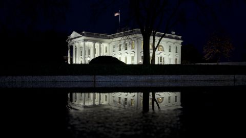 The White House, pictured here on February 3, shines through a wet evening.