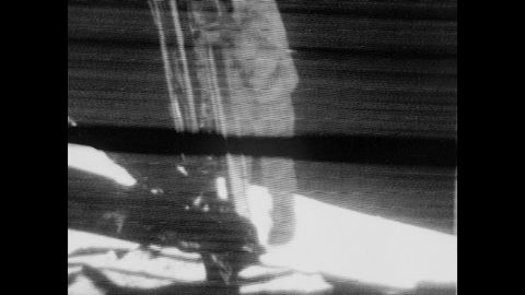 This well-known angle shows Neil Armstrong's first step on the moon. A new film has a different view.