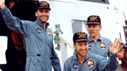 The crew of Apollo 13 after splashdown, from left to right: Fred Haise, Jim Lovell, and John Swigert. Apollo 13 was scheduled to be the third lunar landing mission. The crew launched on April 11, 1970, but two days later and about 205,000 miles from Earth the service module oxygen tank ruptured, crippling the spacecraft. "Houston, we've had a problem," Lovell said. Instead of landing, the crew did a flyby and came home, safely splashing down in the Pacific on April 17. Lovell's book "Lost Moon" became the basis for the motion picture "Apollo 13."