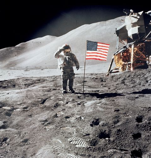 Scott salutes the U.S. flag during an Apollo 15 moonwalk.
