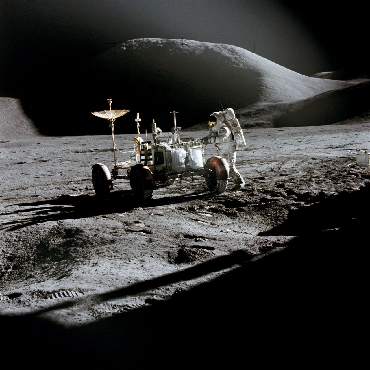 Irwin works near the lunar rover.