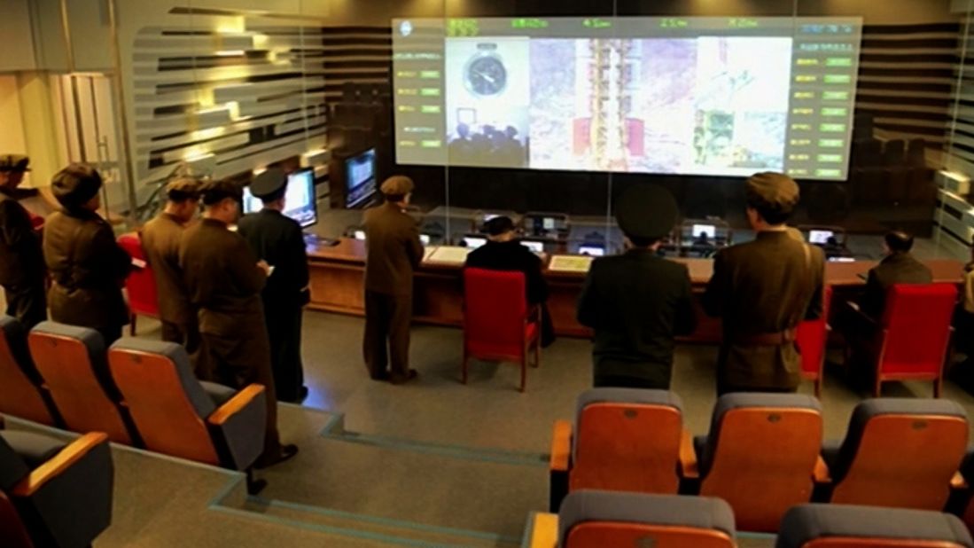 An official photograph shows the control room. 