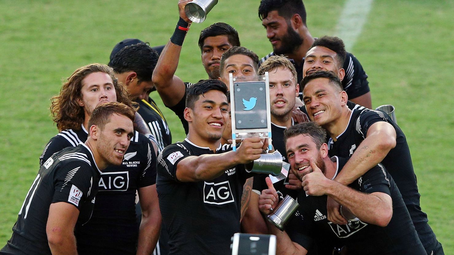 Selfie superstars: The All Blacks team celebrates after its 27-24 win over Australia in the final of the HSBC Sydney Sevens.