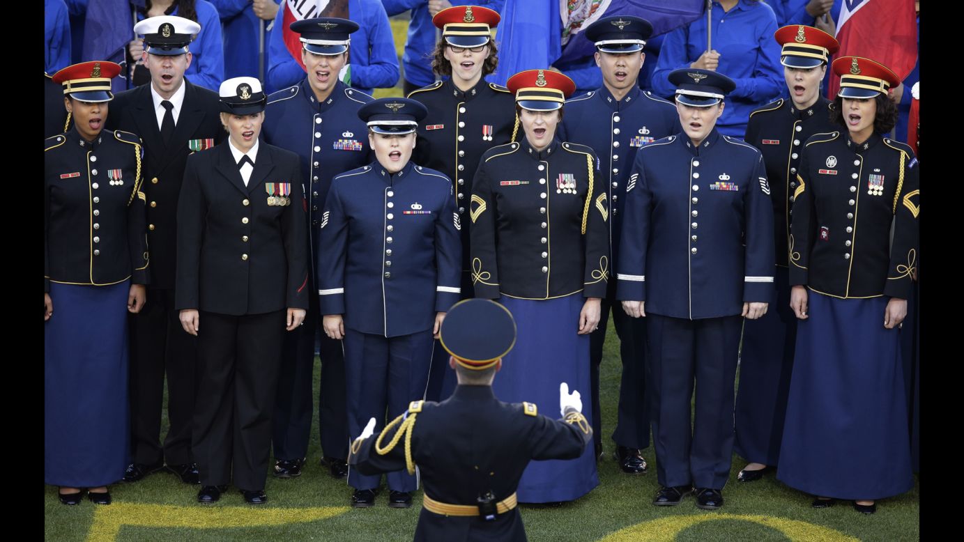 Members of the U.S. military sing "America the Beautiful."