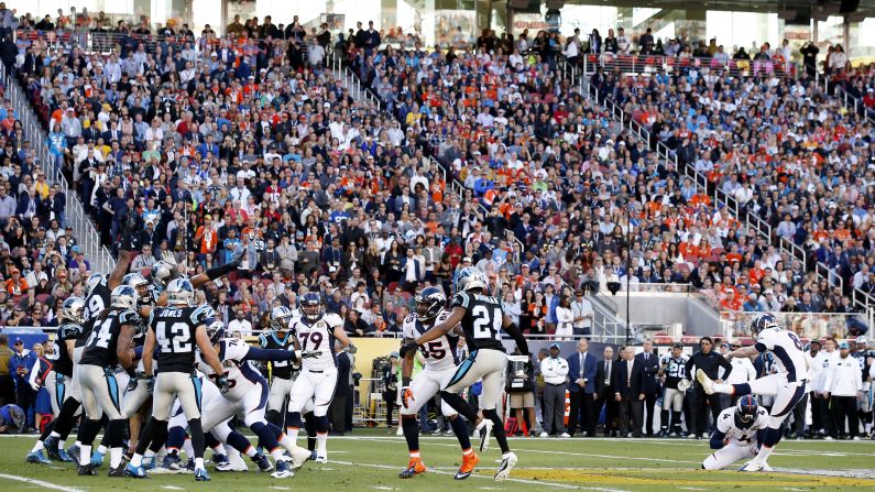 Denver kicker Brandon McManus kicks a field goal -- the first score of the game.