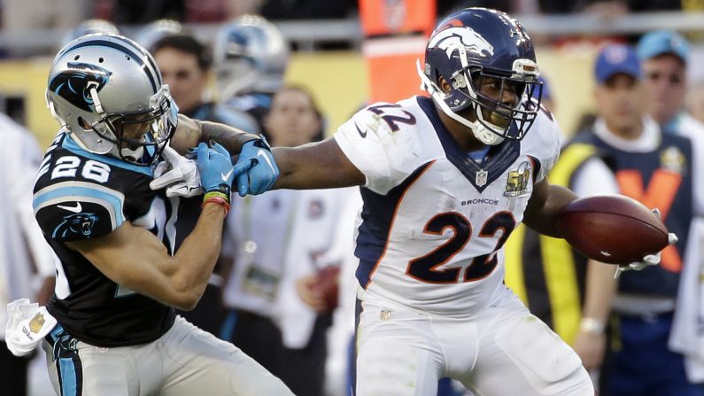 Anderson pushes off Cortland Finnegan as he runs the ball during the first half.