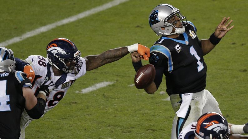 Miller strips the ball from Newton. He was named the game's <a href="index.php?page=&url=http%3A%2F%2Fwww.cnn.com%2F2015%2F01%2F25%2Fus%2Fgallery%2Fsuper-bowl-mvps%2Findex.html" target="_blank">Most Valuable Player</a>.