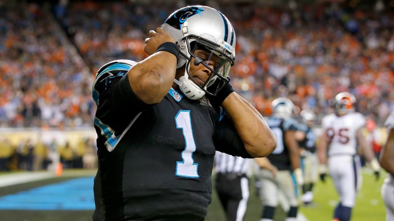 Panthers quarterback Cam Newton -- the league's Most Valuable Player this season -- reacts after a play in the fourth quarter. He was sacked six times by the dominant Denver defense, which was also credited with a sack on Ted Ginn Jr.