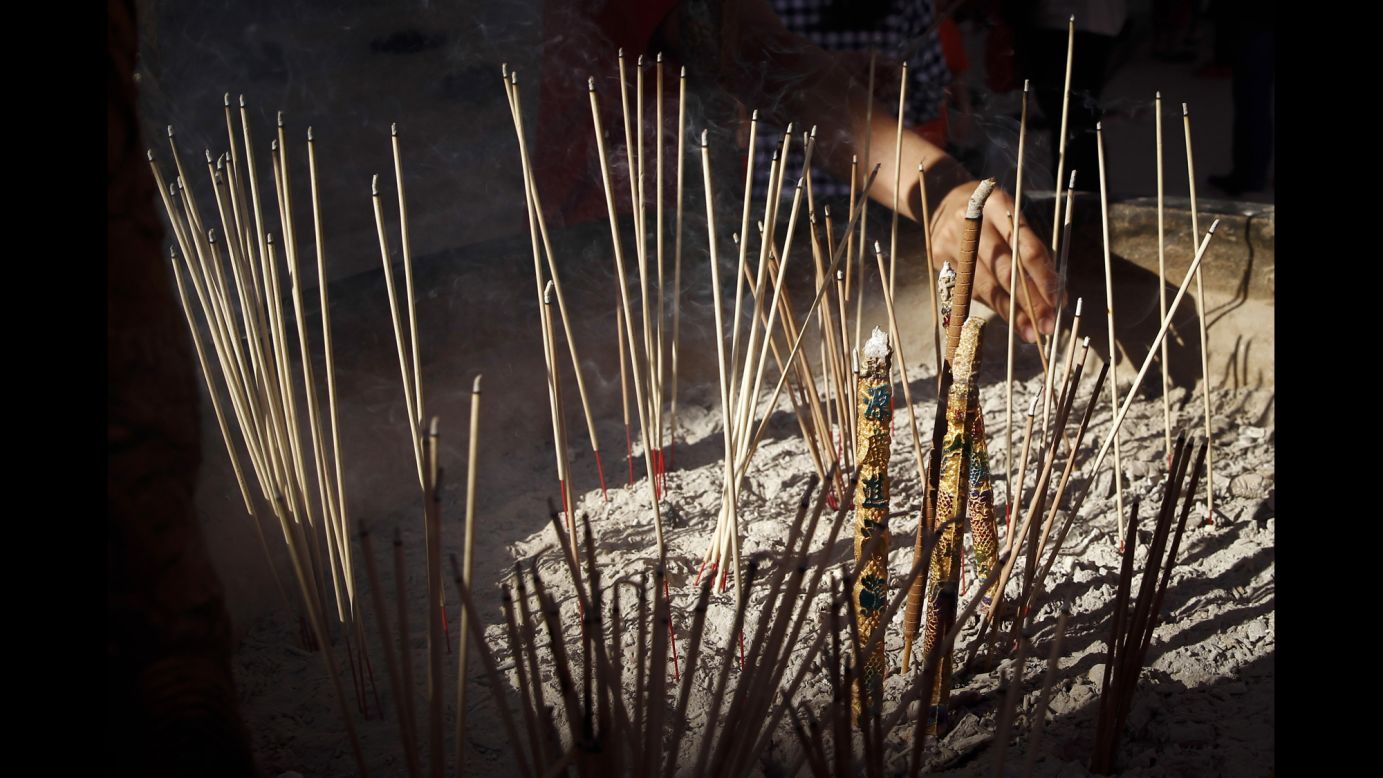 Joss sticks are burned at a temple in Kuala Lumpur, Malaysia, on February 8.