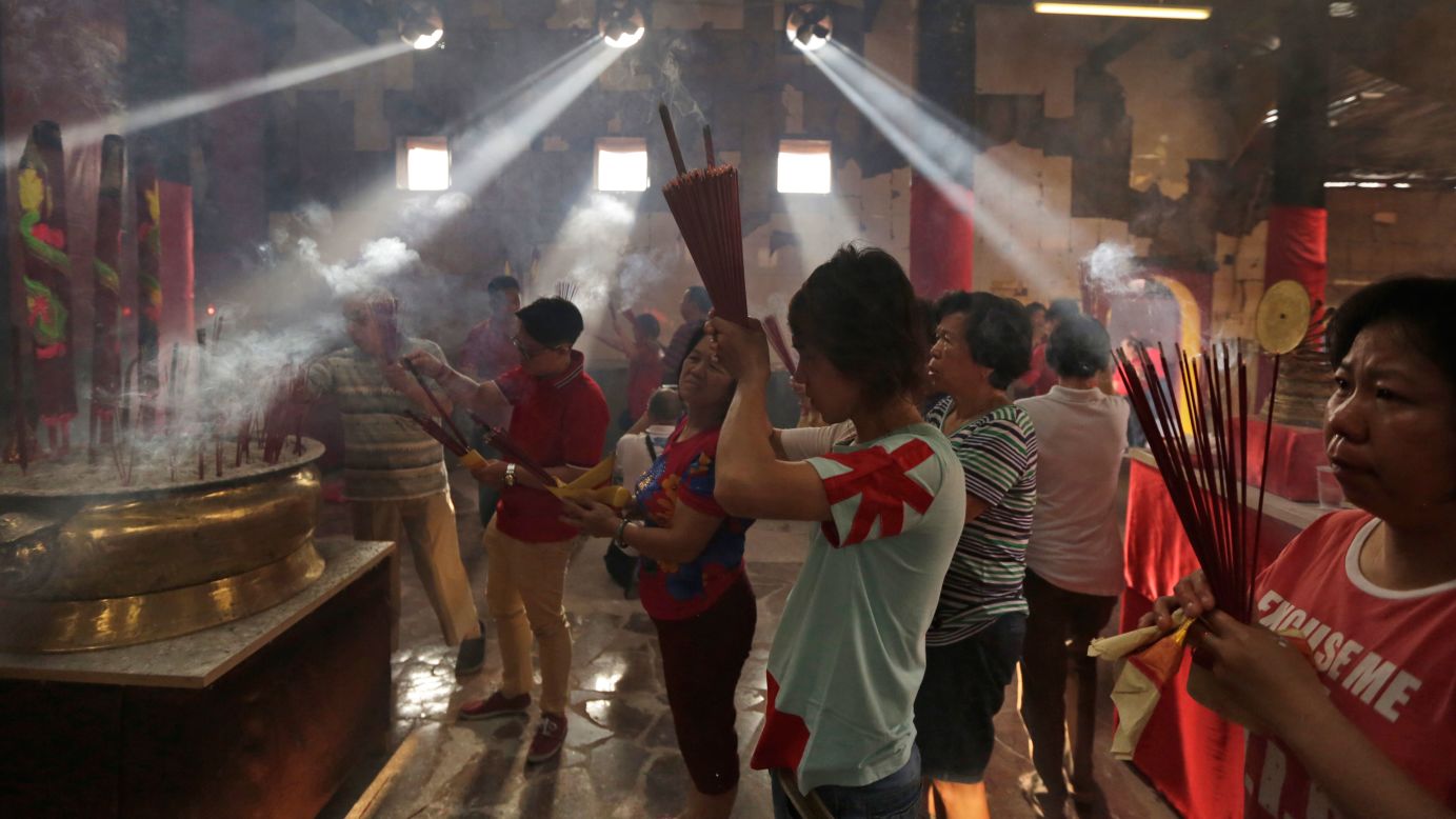 People pray at the Dharma Bhakti Temple in Jakarta, Indonesia, on February 8.