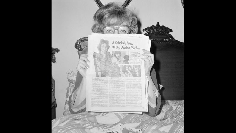 Sunny Schulman Meisler -- mother of acclaimed photographer Meryl Meisler -- reads an article in November 1978. From February 25 to April 9, the Steven Kasher Gallery in New York will present a <a href="index.php?page=&url=http%3A%2F%2Fwww.stevenkasher.com%2Fexhibitions%2Fmeryl-meisler" target="_blank" target="_blank">solo exhibition</a> of Meryl Meisler's earliest work. It will include this photo and more than 35 other moments Meisler captured throughout the 1970s. "Meisler's photographs take us to the kitsch-filled rooms of her hometown in Long Island, and to the gritty clubs and streets of disco-era New York," the gallery said.