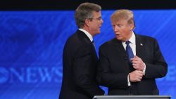 MANCHESTER, NH - FEBRUARY 06:  Republican presidential candidates Jeb Bush (L) and Donald Trump talk following the Republican presidential debate at St. Anselm College February 6, 2016 in Manchester, New Hampshire. Sponsored by ABC News and the Independent Journal Review, this is the final televised debate before voters go to the polls for the New Hampshire primary on February 9.  (Photo by Joe Raedle/Getty Images)