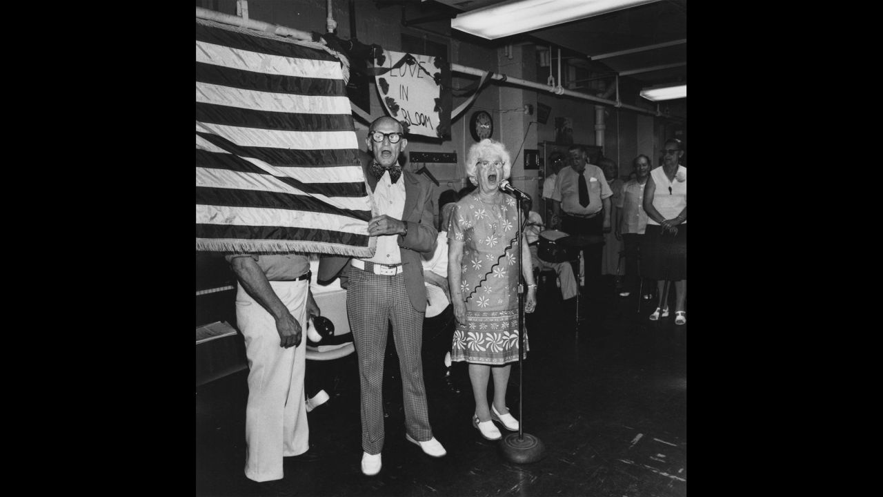 People sing "God Bless America" at a New York City senior center in 1978.
