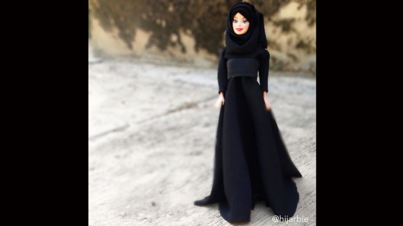 While <a href="https://www.instagram.com/p/-mZgjjw4ll/" target="_blank" target="_blank">Barbie loves a LBD </a>(little black dress), Hijarbie prefers a longer version.