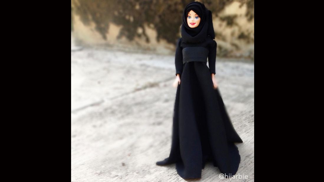 While <a href="https://www.instagram.com/p/-mZgjjw4ll/" target="_blank" target="_blank">Barbie loves a LBD </a>(little black dress), Hijarbie prefers a longer version.