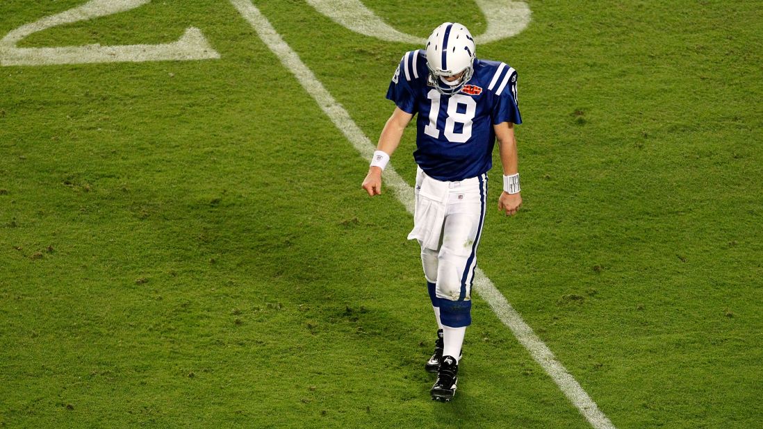 Manning walks off the field during Super Bowl XLIV in 2010. The Colts lost to the New Orleans Saints 31-17.