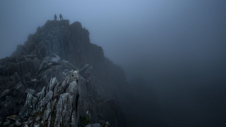"Two walkers peer into the gloom on Tryfan's north ridge in Snowdonia, north Wales." -- <a href="http://www.gregwhitton.com" target="_blank" target="_blank">Greg Whitton</a>, UK 