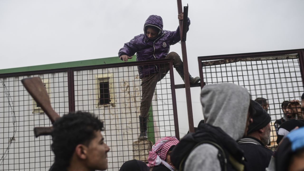 A child tries to flee Aleppo in February as thousands of Syrians tried to cross the Turkish border.