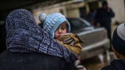 Refugees wait near the Turkish border crossing gate as Syrians fleeing the northern embattled city of Aleppo wait on February 6, 2016 in Bab al-Salama, near the city of Azaz, northern Syria.
Thousands of Syrians were braving cold and rain at the Turkish border Saturday after fleeing a Russian-backed regime offensive on Aleppo that threatens a fresh humanitarian disaster in the country's second city. Around 40,000 civilians have fled their homes over the regime offensive, according to the Syrian Observatory for Human Rights monitor. / AFP / BULENT KILIC        (Photo credit should read BULENT KILIC/AFP/Getty Images)