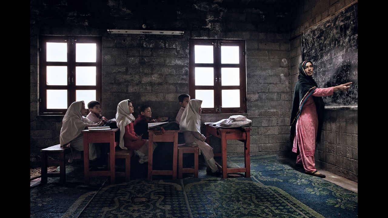 "Foundation School in Chalt Pain, Gilgit-Baltistan, northern Pakistan. Electricity shortages in the area make it difficult for students in schools; they often have to move around the classroom in order to get the natural light they need to read their books." -- <a href="http://www.afrancolini.com" target="_blank" target="_blank">Andrea Francolini</a>, Australia