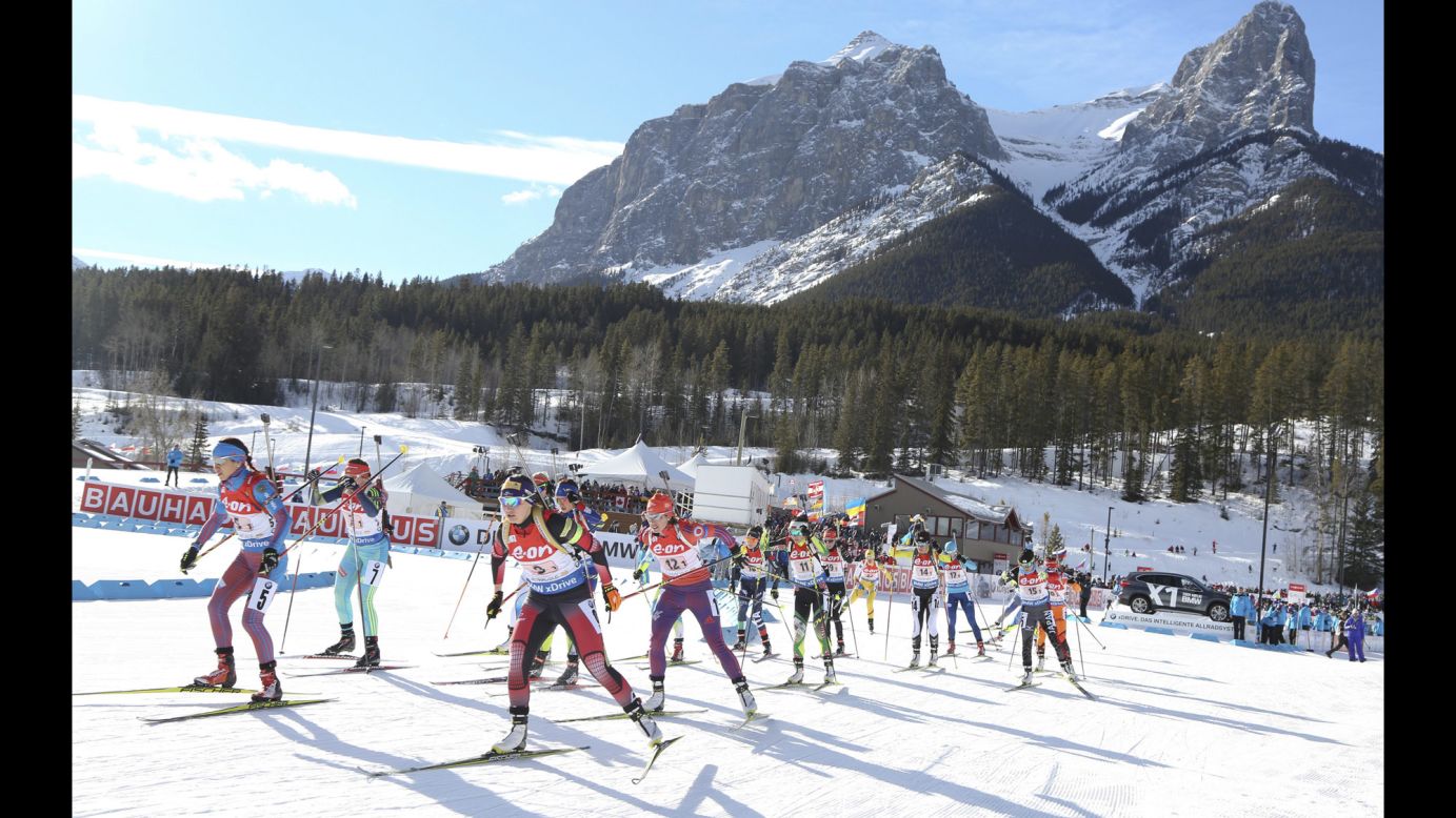 Biathletes leave the start area of a World Cup race in Canmore, Alberta, on Sunday, February 7.
