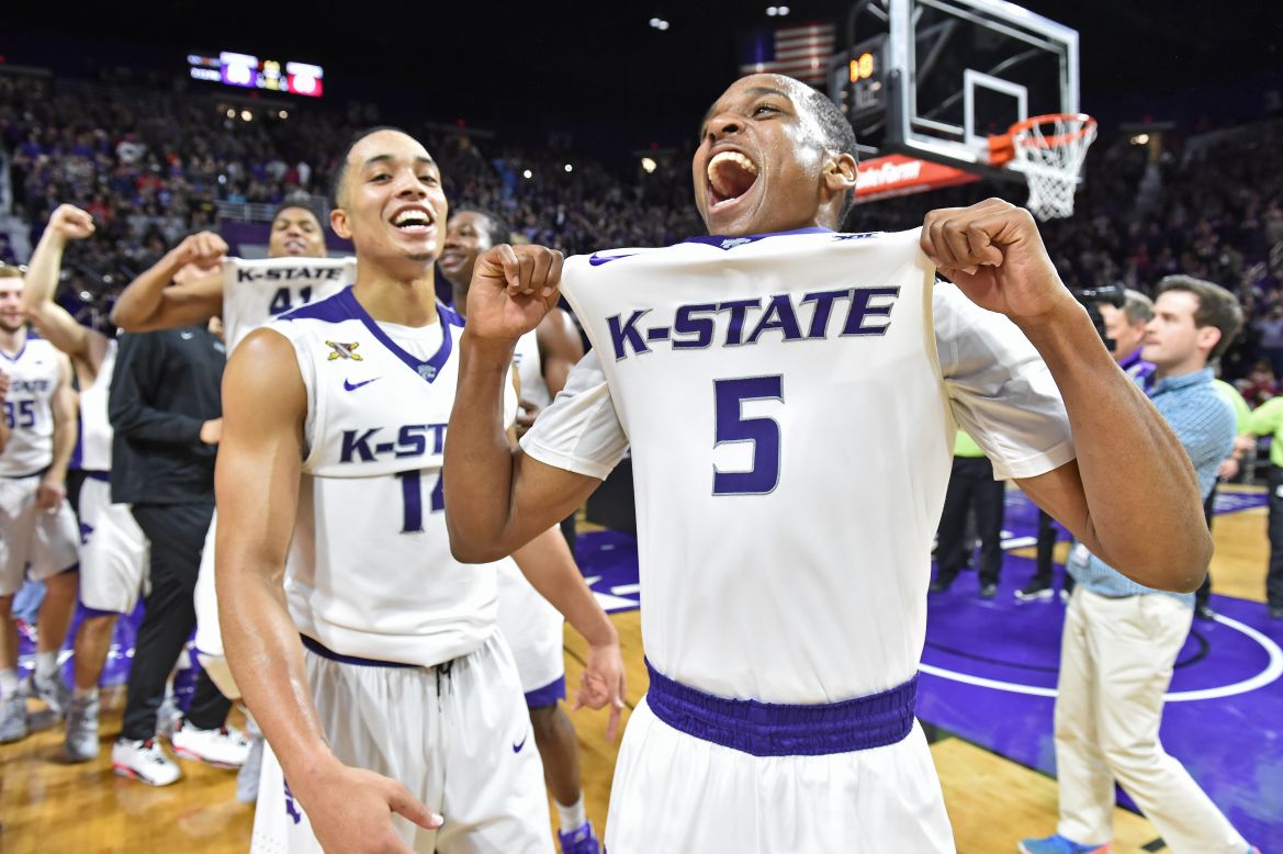 Kansas State guard Barry Brown (No. 5) celebrates with his teammates after they knocked off No. 1 Oklahoma on Saturday, February 6. The Wildcats won 80-69 in Manhattan, Kansas.