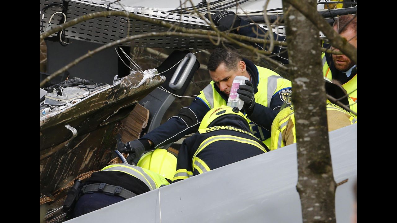 Rescue personnel tend to an injured person.