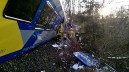 Rescue workers at the site of the train collision near Bad Aibling, Germany, on Tuesday.