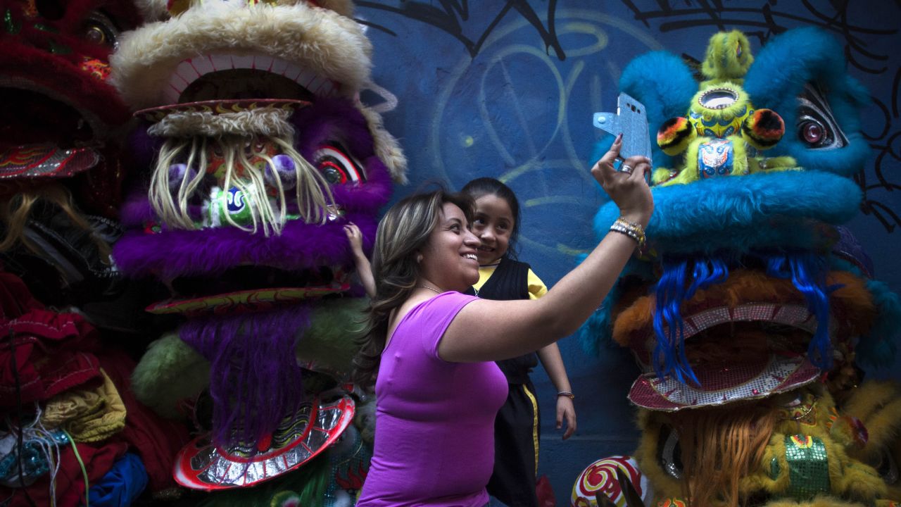 People take a selfie in Mexico City's Chinatown area on Friday, February 5, ahead of the <a href="http://www.cnn.com/2016/01/31/world/gallery/year-of-the-monkey-lunar-new-year/index.html" target="_blank">Lunar New Year</a> holiday.