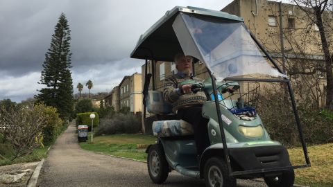 At Shaar Ha'amakim, senior citizens drive golf carts down quiet roads.