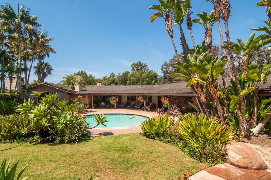 The main house was designed by architect Cliff May, known for his "California Ranch House," which typically features a long, low roof. Stretching over 5,000 square feet, Winfrey's new house features four bedrooms, four fireplaces, and overlooks a pool.