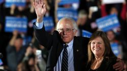 Sen. Bernie Sanders (D-VT) and his wife Jane O'Meara Sanders wave to supporters onstage after declaring victory over Hillary Clinton in the New Hampshire Primary onFebruary 9, 2016 in Concord, New Hampshire.