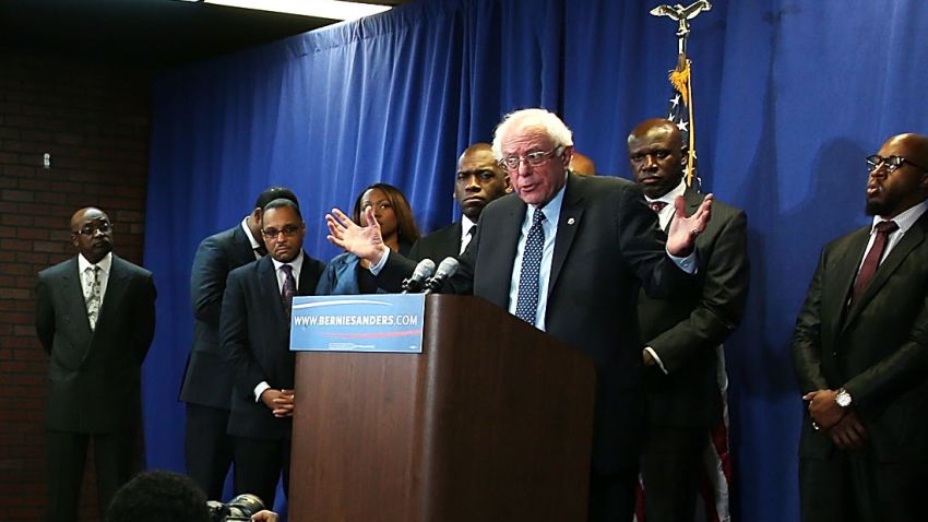 BALTIMORE, MD - DECEMBER 08:  Democratic presidential candidate Sen. Bernie Sanders, (I-VT) speaks while flanked by African-American religious and civic leaders after a meeting at the Freddie Gray Youth Empowerment Center, December 8, 2015 in Baltimore, Maryland. Earlier in the day Sanders toured the Sandtown-Winchester neighborhood where Freddie Gray lived and was arrested.  (Photo by Mark Wilson/Getty Images)