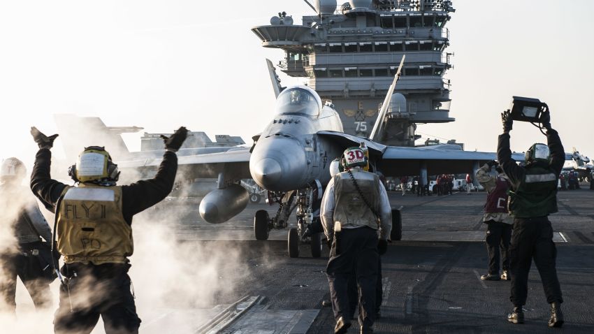 160202-N-GK939-170 ARABIAN GULF (Feb. 2, 2016) Sailors direct an F/A-18C Hornet, assigned to the "Rampagers" of Strike Fighter Squadron (VFA) 83, on the flight deck of aircraft carrier USS Harry S. Truman (CVN 75). Harry S. Truman Carrier Strike Group is deployed in support of Operation Inherent Resolve, maritime security operations, and theater security cooperation efforts in the U.S. 5th Fleet area of operations. (U.S. Navy photo by Mass Communication Specialist Seaman Lindsay A. Preston/Released)