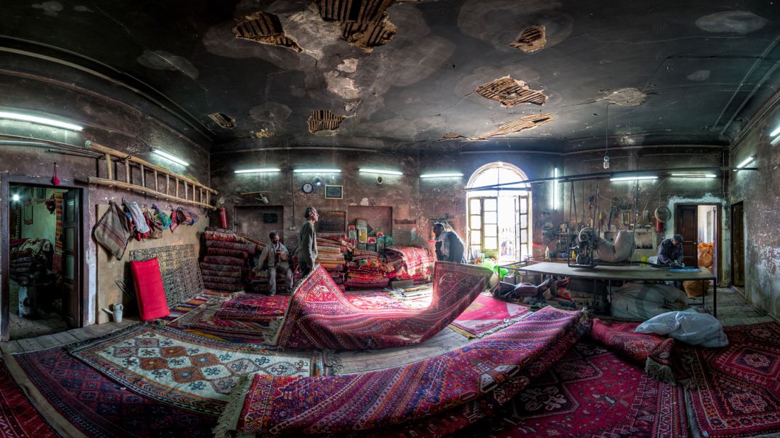 Carpet-making is one of the oldest and most important industries in Iran, says Ganji. "I tried to capture the spirit of life which exists in this workshop and its workers. Every carpet brought here to be repaired has a spirit too."