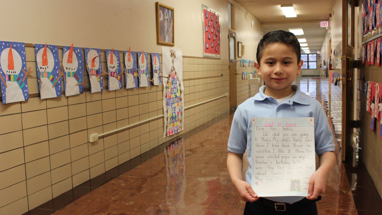 First-grader Diego Mora tells Pope Francis he is glad the pontiff is heading to Mexico.