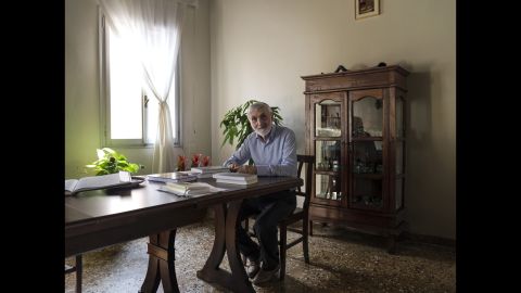 Rabbi Scialom Bahbout is seen in the dining room of his ghetto residence. He left Libya in 1968 and has lived in Venice for decades.
