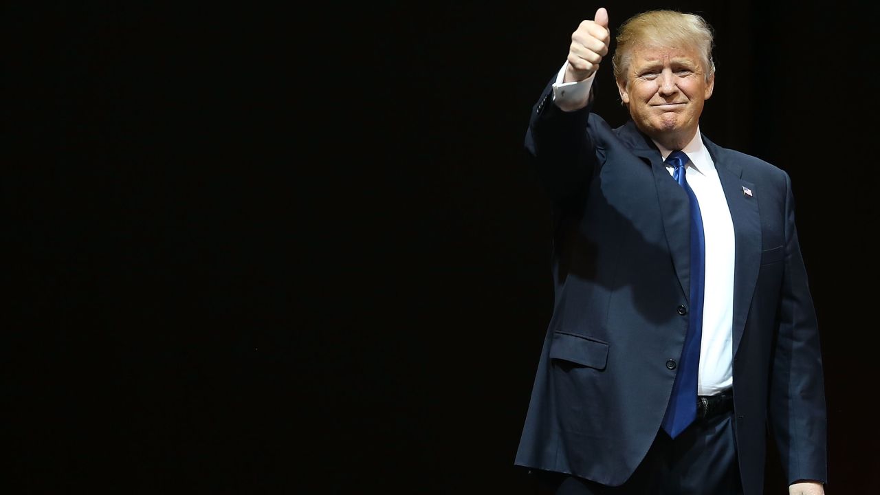 MANCHESTER, NH - FEBRUARY 08:  Republican presidential candidate Donald Trump walks on stage as he is introduced during a campaign rally at Verizon Wireless Arena on February 8, 2016 in Manchester, New Hampshire. Democratic and Republican Presidential candidates are finishing up with the last full day of campaigning before voters head to the polls tomorrow.  (Photo by Joe Raedle/Getty Images)