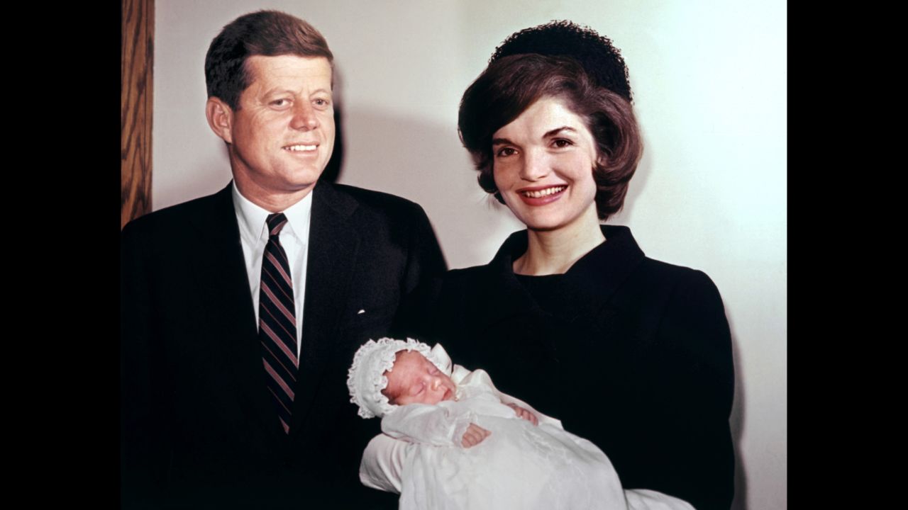 The Kennedys moved into the White House with their two young children, John and Caroline. John is seen here shortly after his November 1960 birth. Caroline was 3.<br />