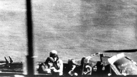 On November 22, 1963, Kennedy was assassinated in Dallas by Lee Harvey Oswald, who was fatally gunned down by Jack Ruby two days later. In this photo, Kennedy flinches as the bullet strikes him in the head.