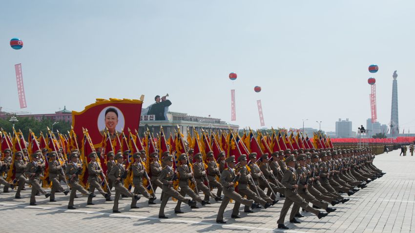 In a photo taken on July 27, 2013 North Korean soldiers march on Kim Il-Sung square during a military parade marking the 60th anniversary of the Korean war armistice in Pyongyang. North Korea mounted its largest ever military parade July 27 to mark the 60th anniversary of the armistice that ended fighting in the Korean War, displaying its long-range missiles at a ceremony presided over by leader Kim Jong-Un.    AFP PHOTO / Ed Jones        (Photo credit should read Ed Jones/AFP/Getty Images)